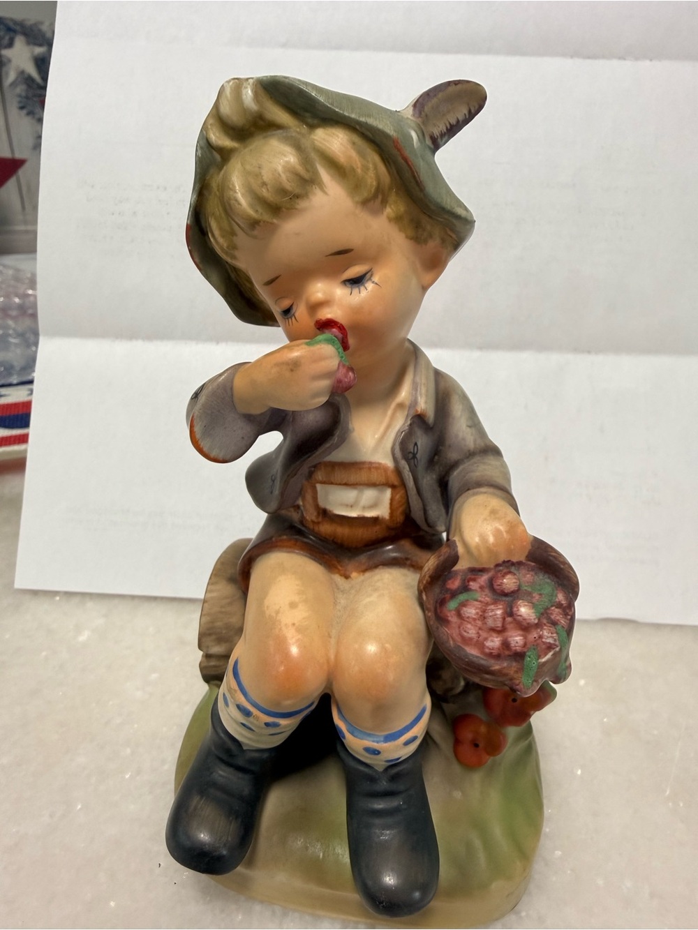 Hummel Boy with Berries Figurine in Cream, Green and Navy